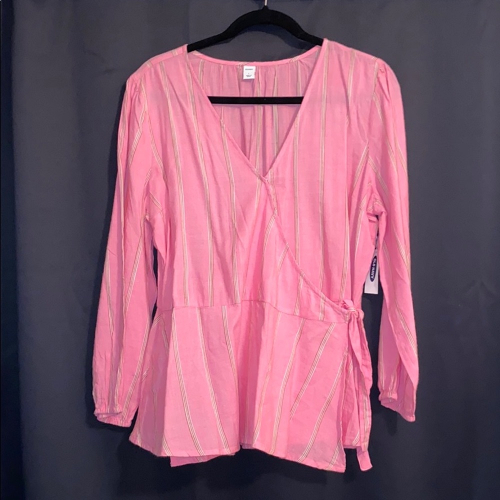 Pink peplum wrap top